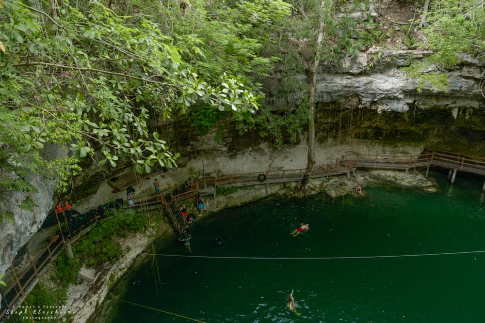people swimming in cenote Xcanche near Valladolid